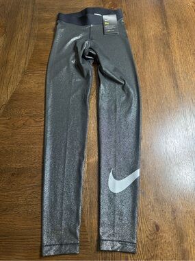 NWT Nike women’s Metallic Bohemina Black Performance Leggings size XS